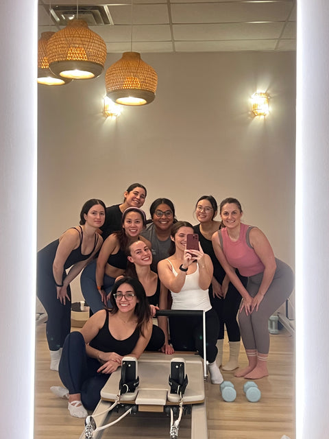 BOLD grip socks worn in a Pilates studio